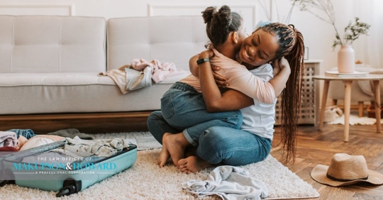 woman hugging child