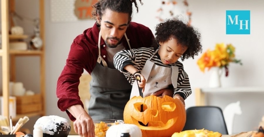 parent and child during Halloween